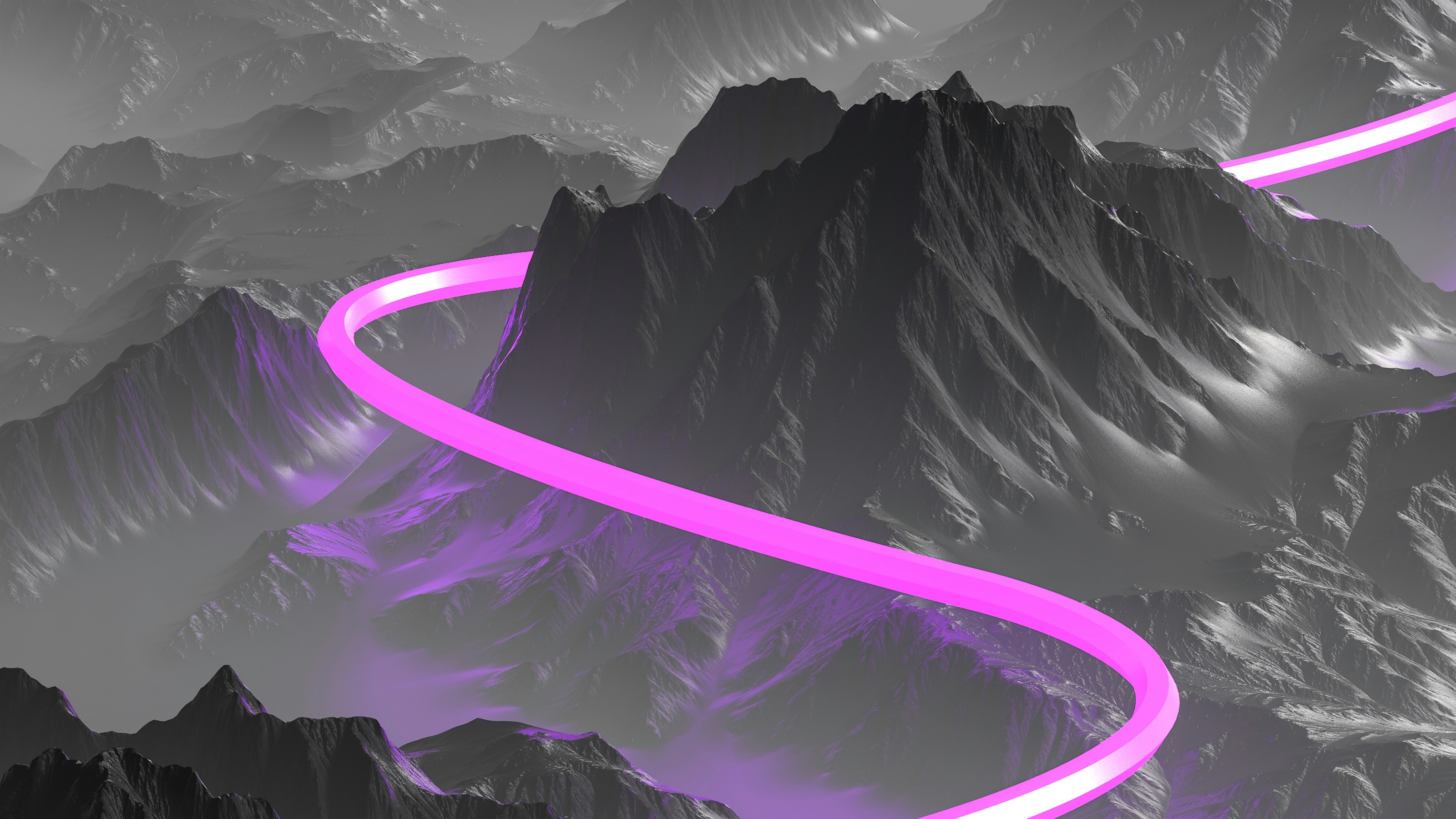 a purple road going through a mountain range