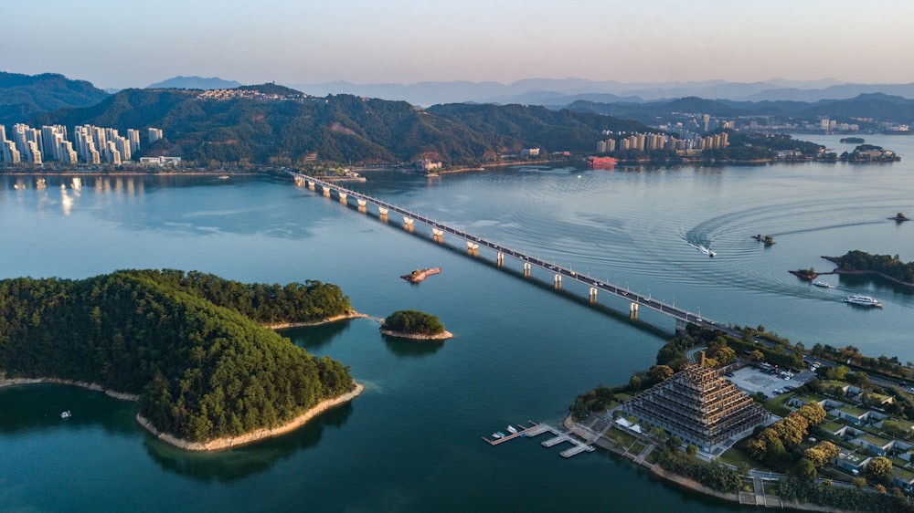 an aerial view of a bridge over a large body of water