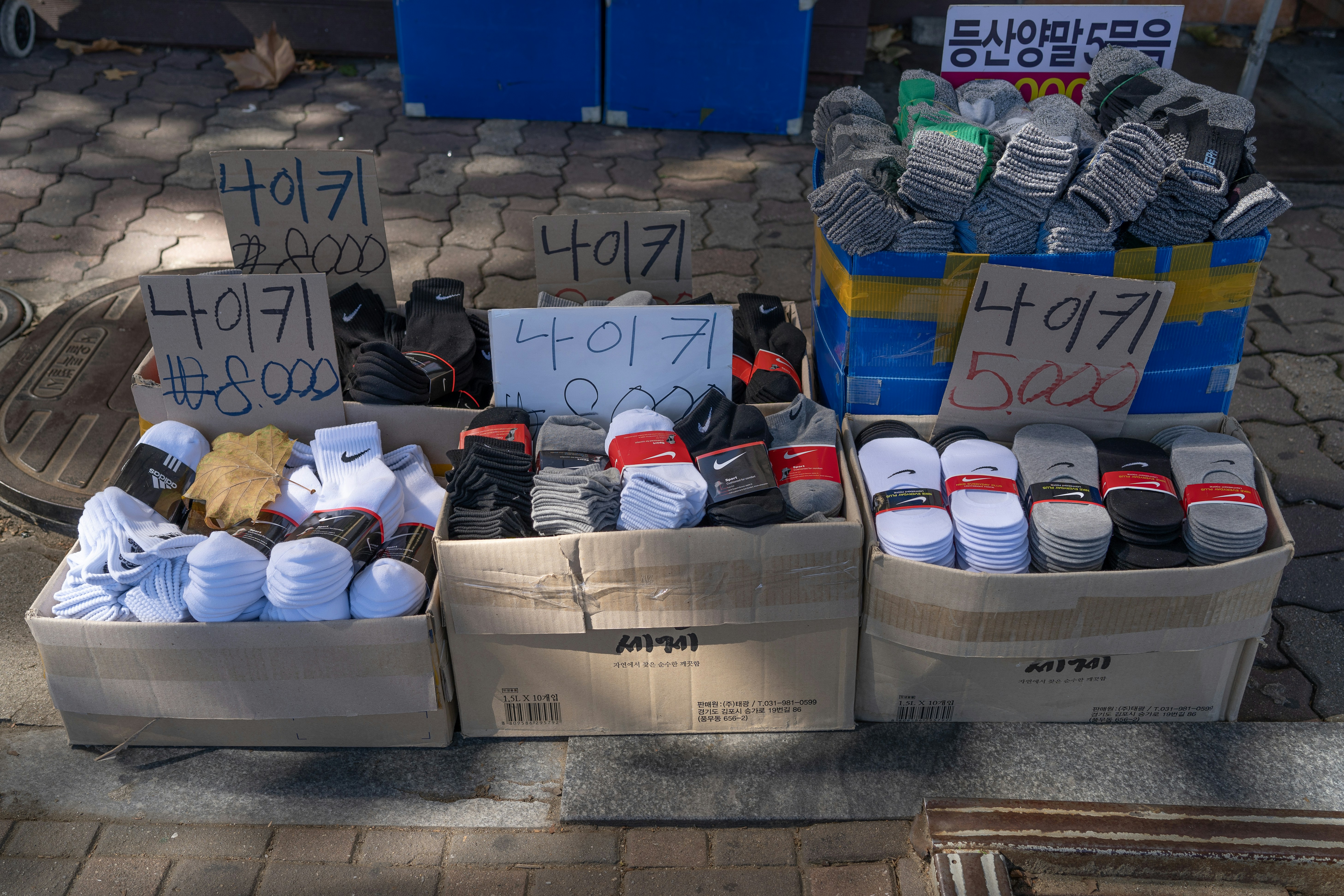 a bunch of shoes that are in boxes