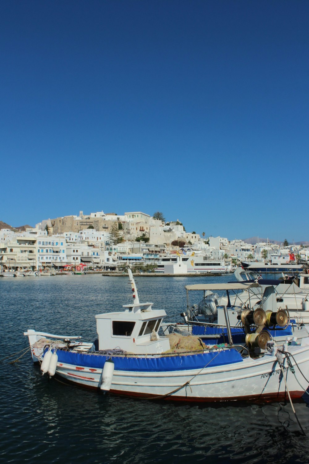 a couple of boats that are sitting in the water