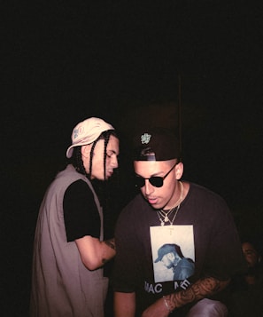a couple of men standing next to each other