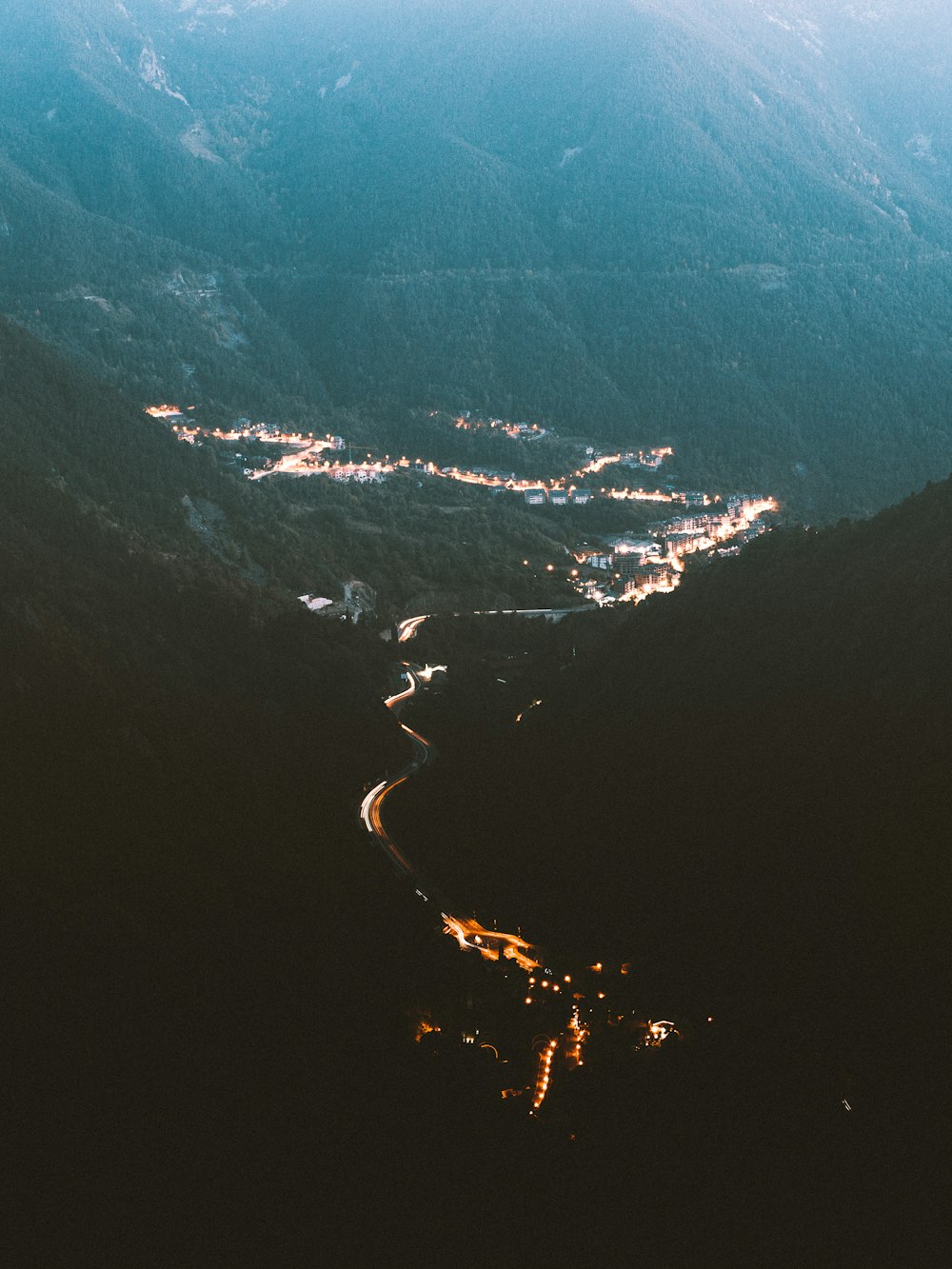 an aerial view of a city at night