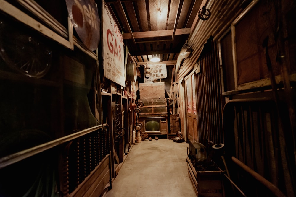 a long narrow hallway with signs on the walls