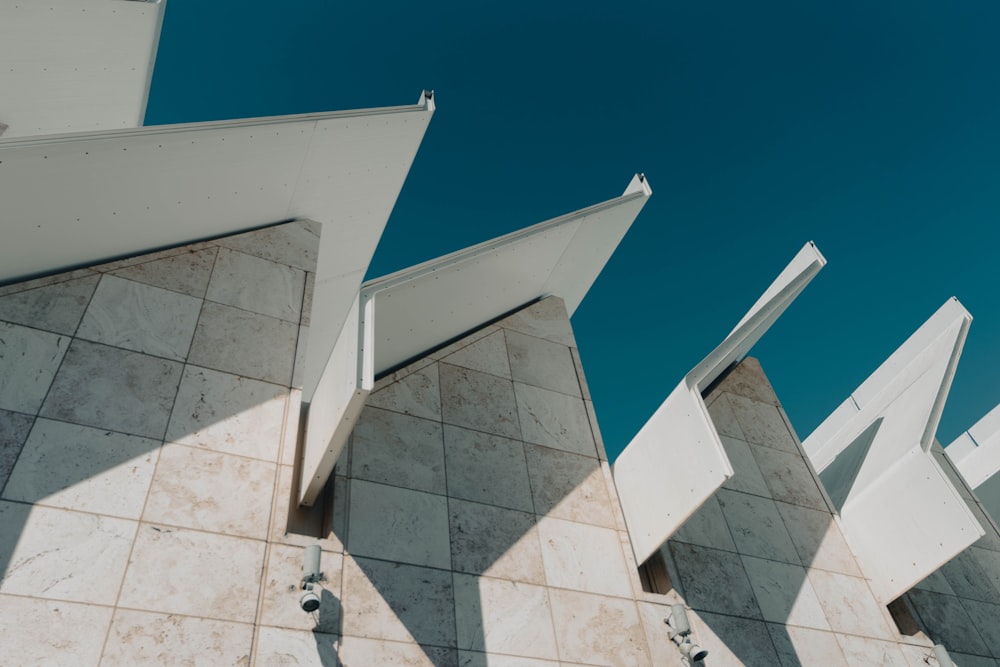 a close up of a building with a blue sky in the background