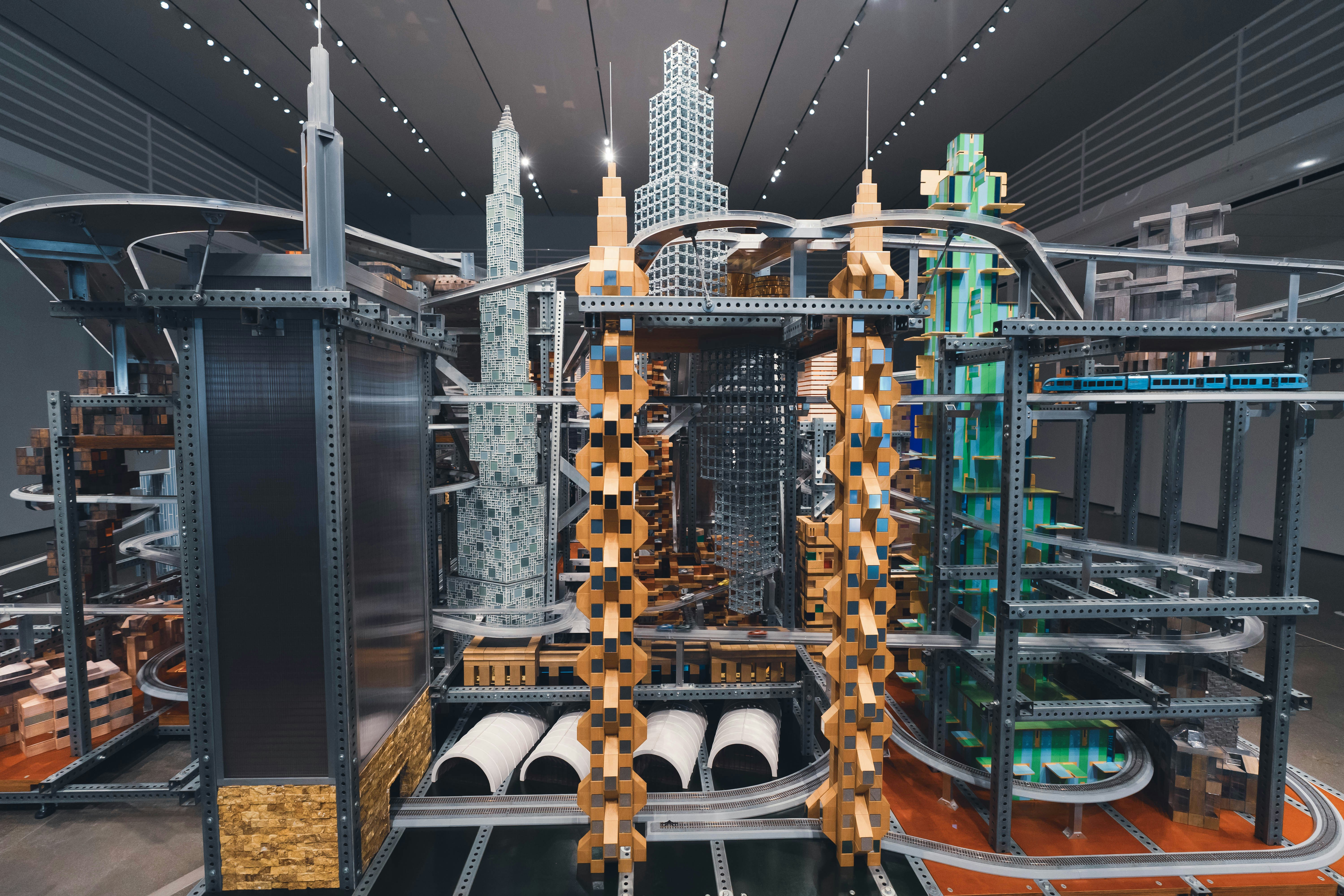 A beautiful and elaborate exhibit replicating a futuristic city. Using motorized tracks, cars and trains zoom around this incredible exhibit.