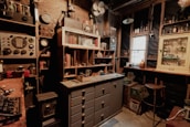 Shelves filled with tools, gadgets, and notes from various experiments and projects.