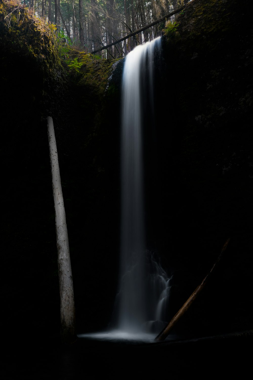 a waterfall in the dark