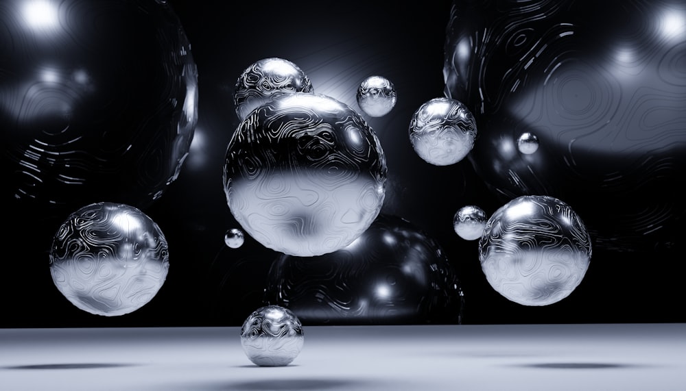 a group of shiny balls floating in the air