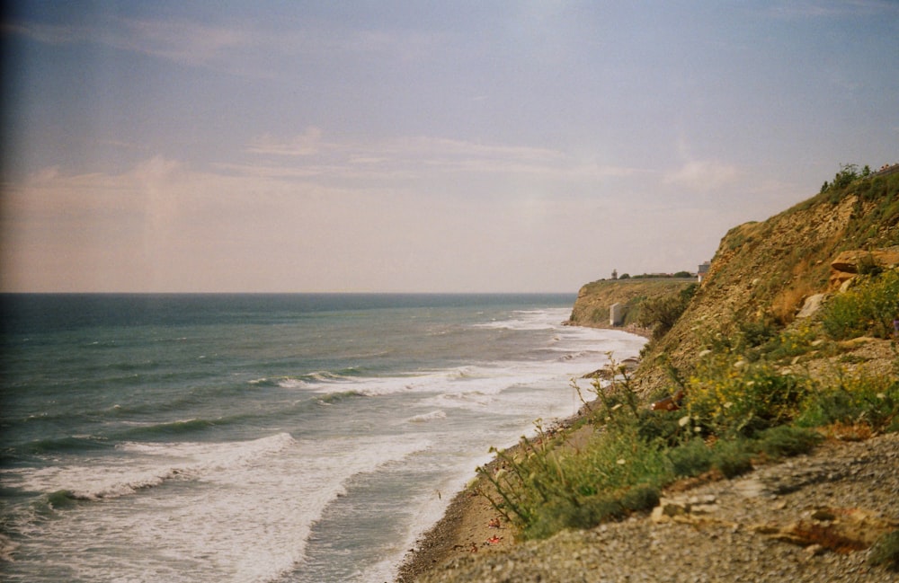 a view of the ocean from a cliff