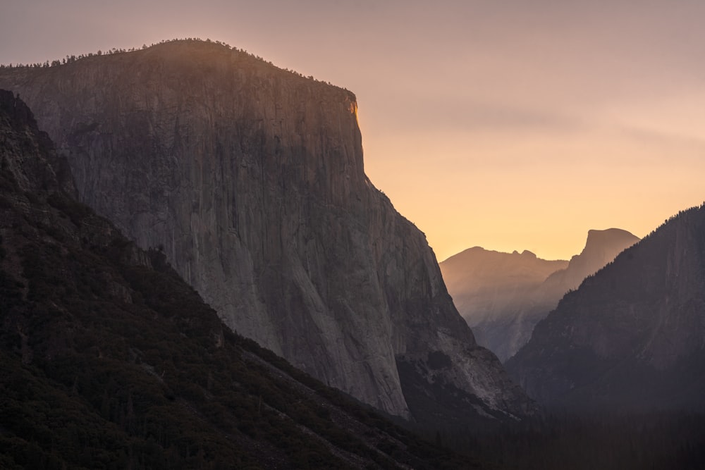 a canyon with a mountain in the background