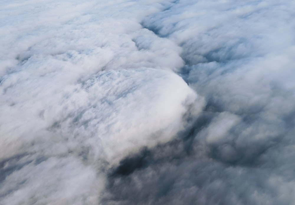 a view of clouds from an airplane window