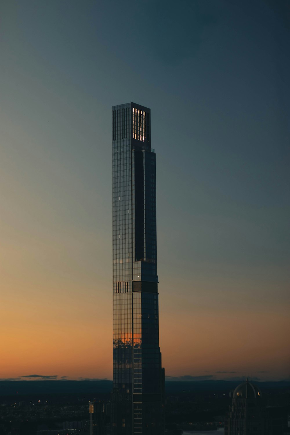 a tall building with a clock on the top of it