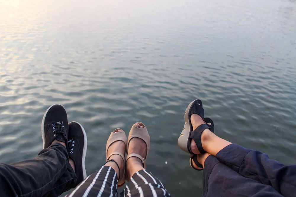 a couple of people sitting on top of a boat