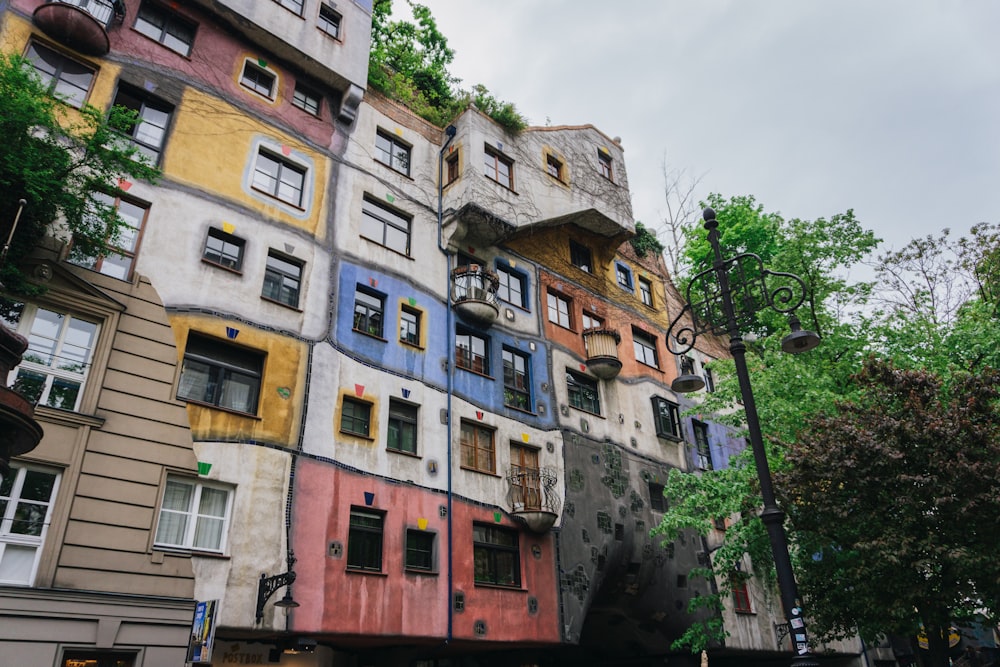 a very tall building with lots of windows and balconies