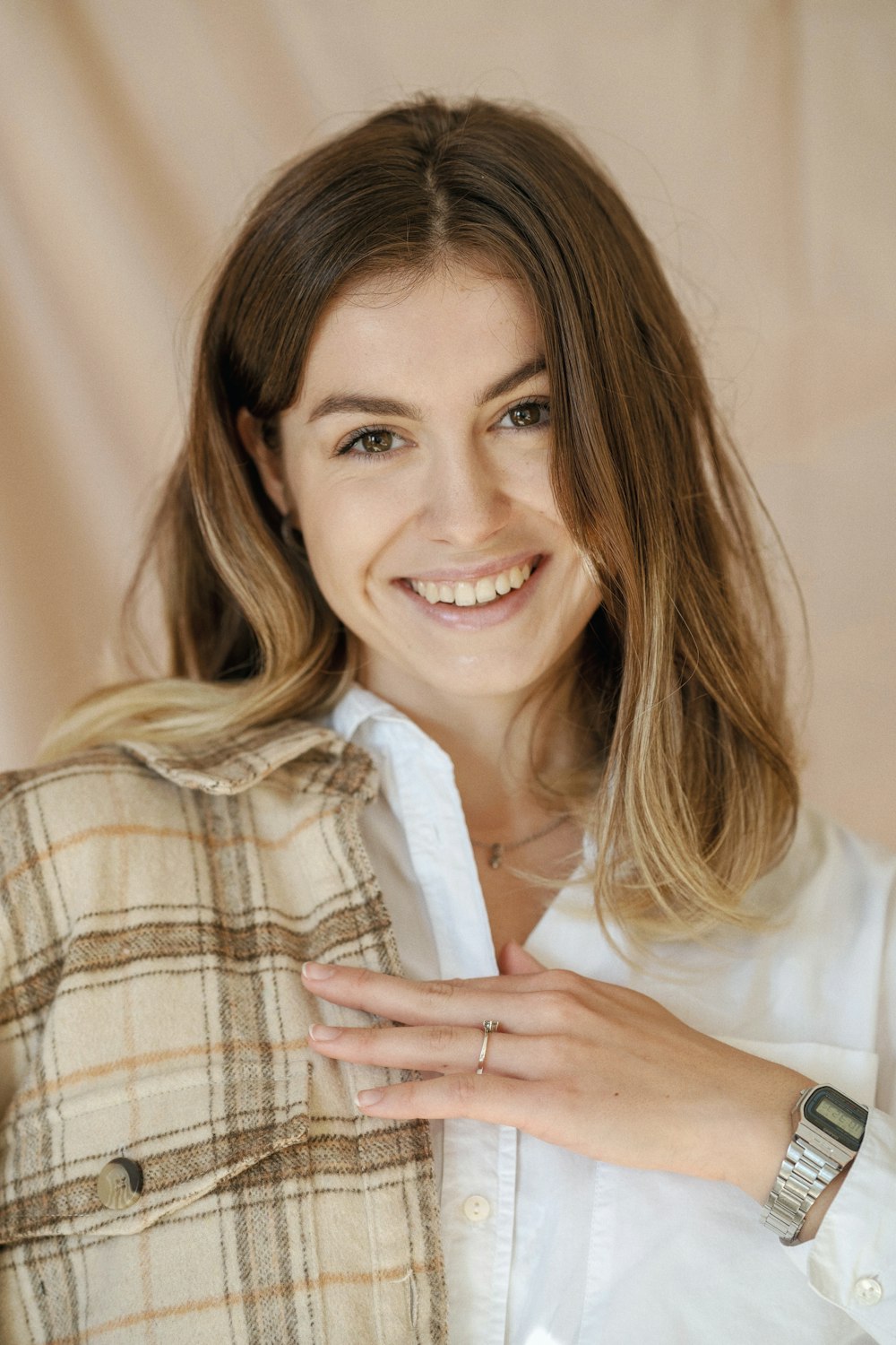 a woman with a watch on her wrist