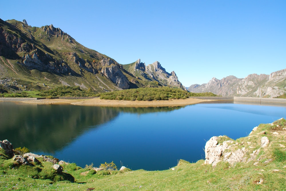 a large body of water surrounded by mountains