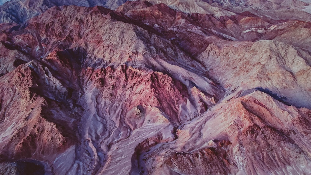 an aerial view of a mountain range in the desert