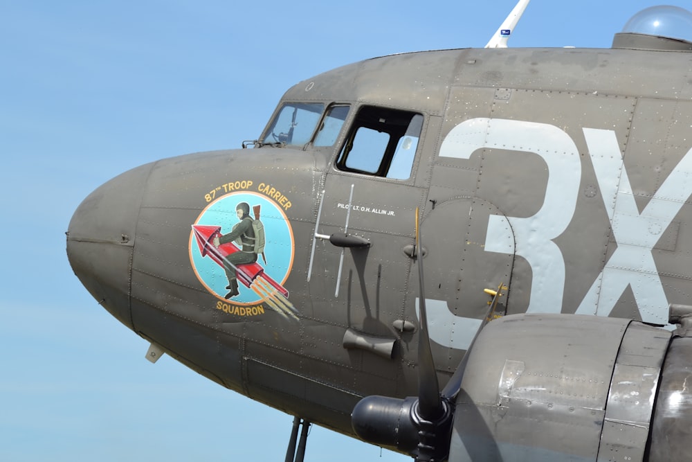 a close up of the nose of a military plane