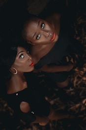 a couple of women standing next to each other
