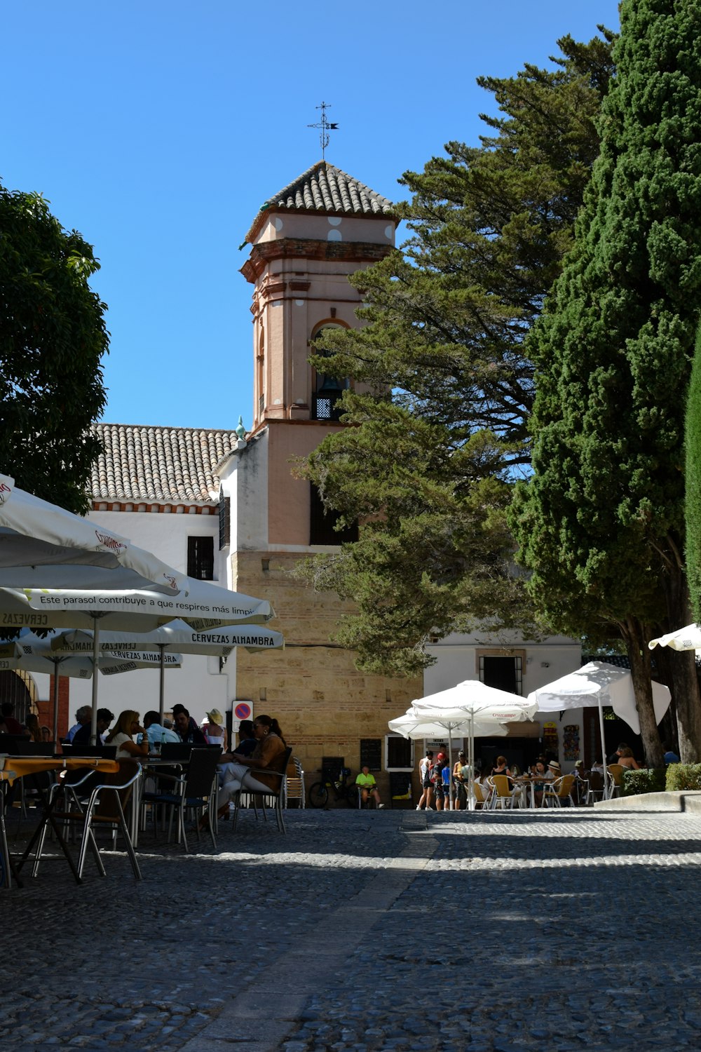 a building with a clock tower in the background