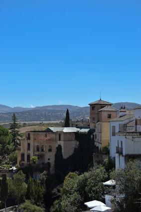 A scenic view of a historical landmark with lush greenery surrounding it.