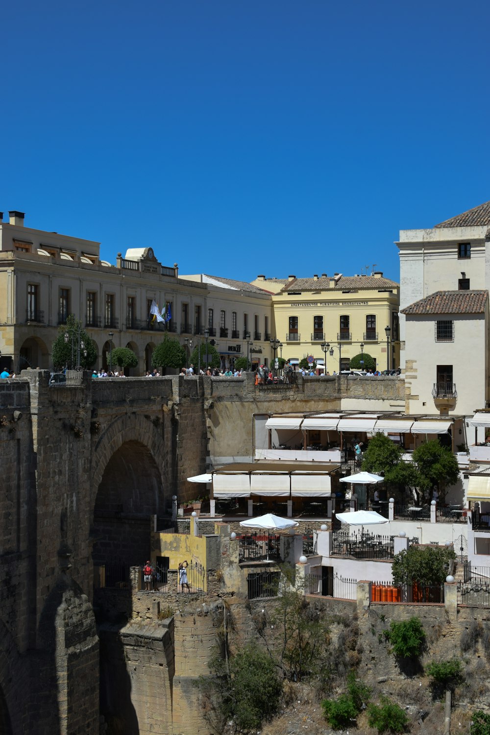 a view of a city with a bridge and buildings