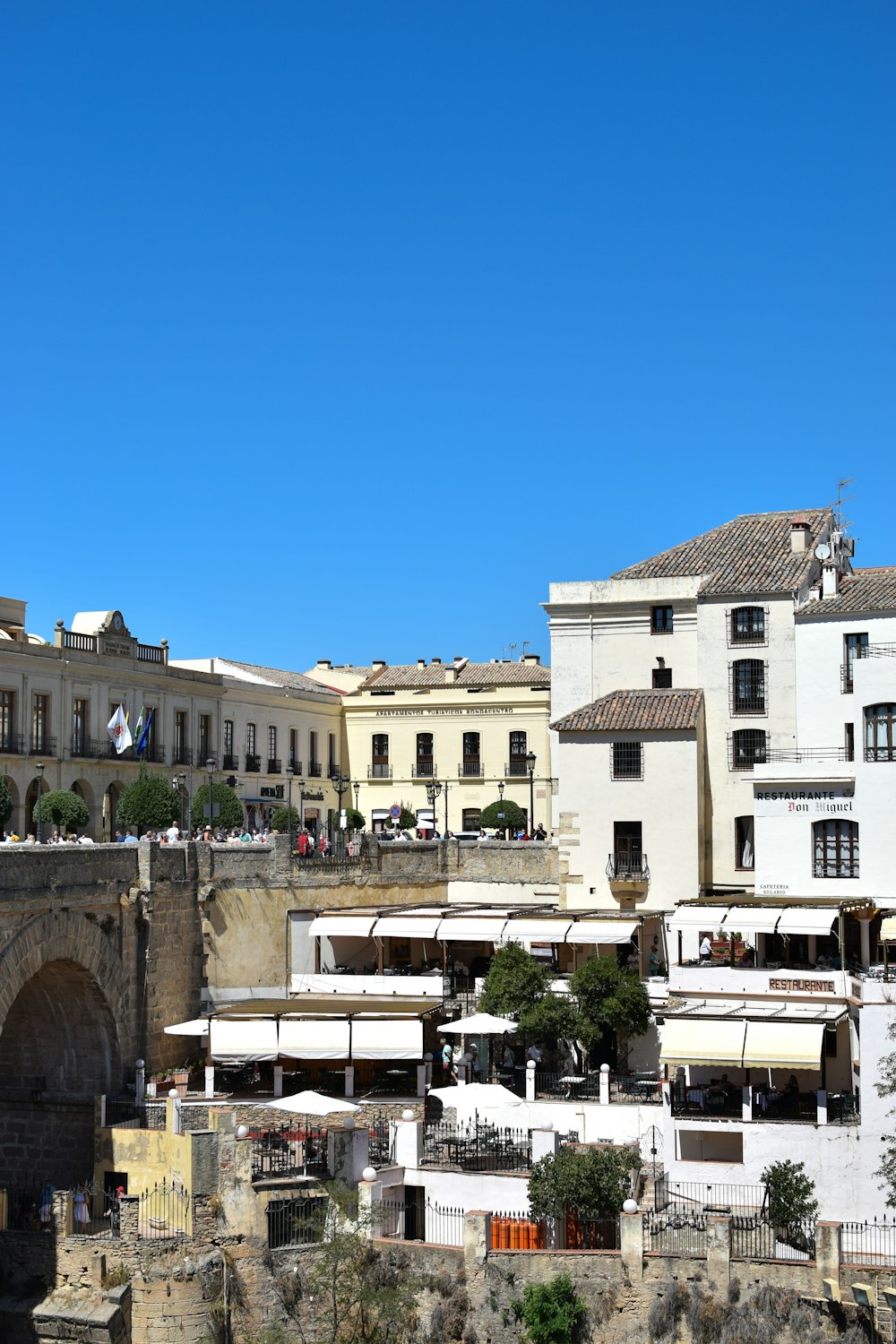 a view of a city with buildings and a bridge