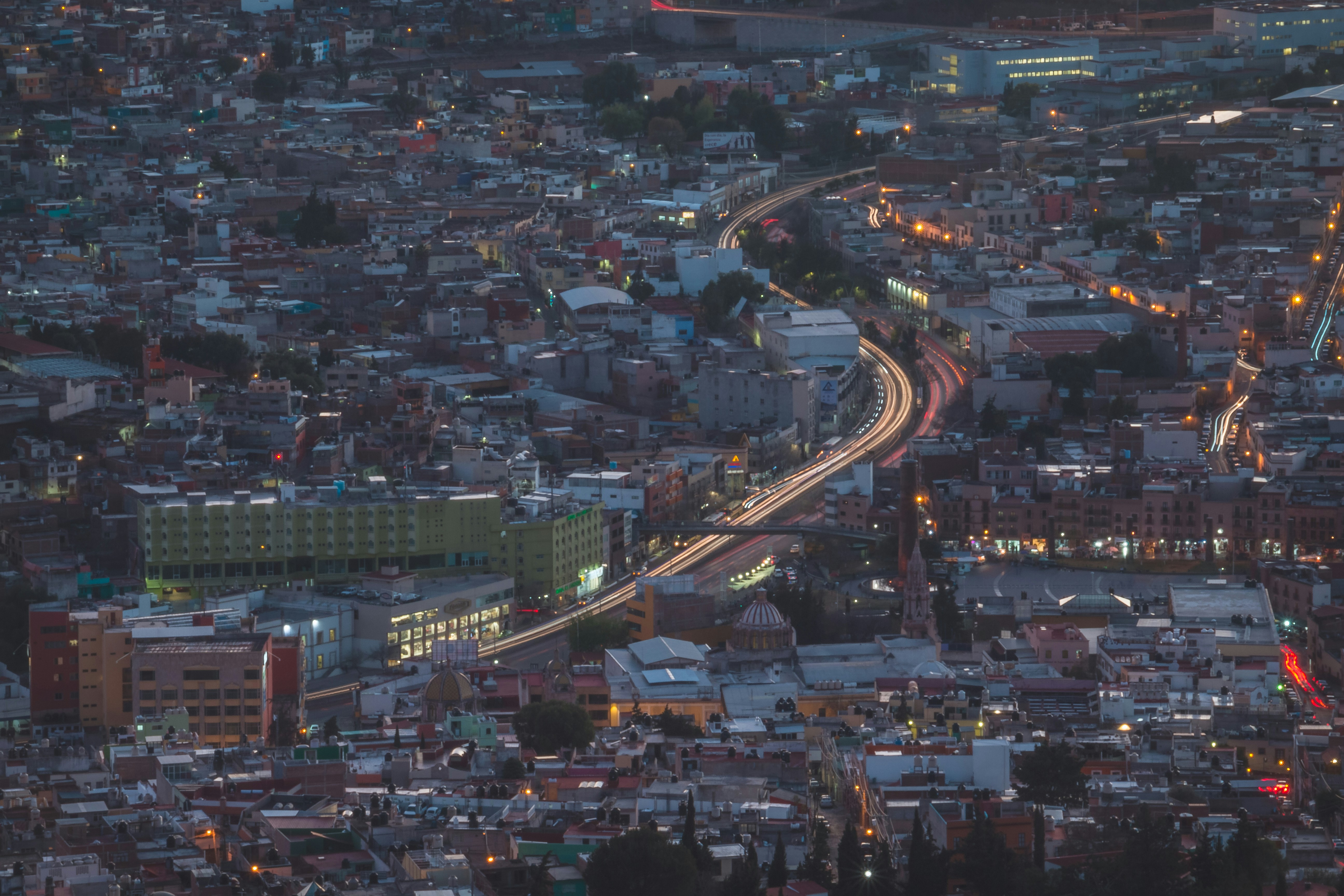 an aerial view of a city at night