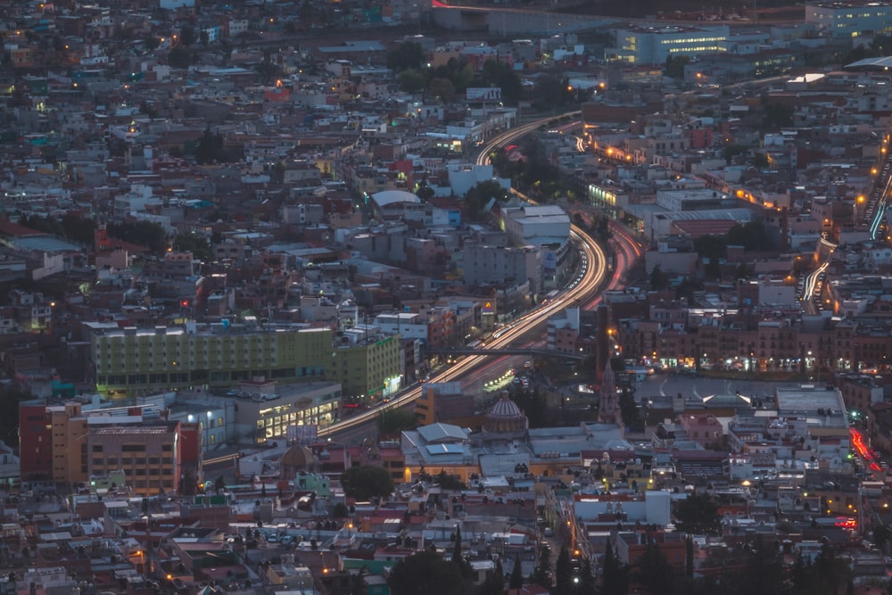 an aerial view of a city at night