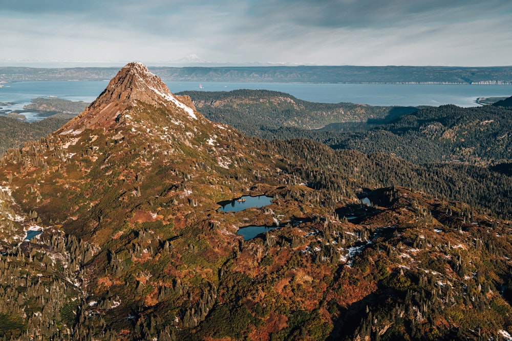 a mountain with a lake in the middle of it