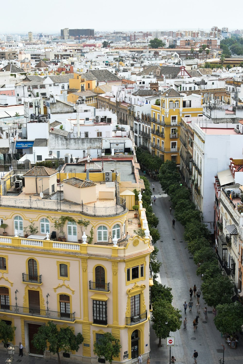 an aerial view of a city with tall buildings