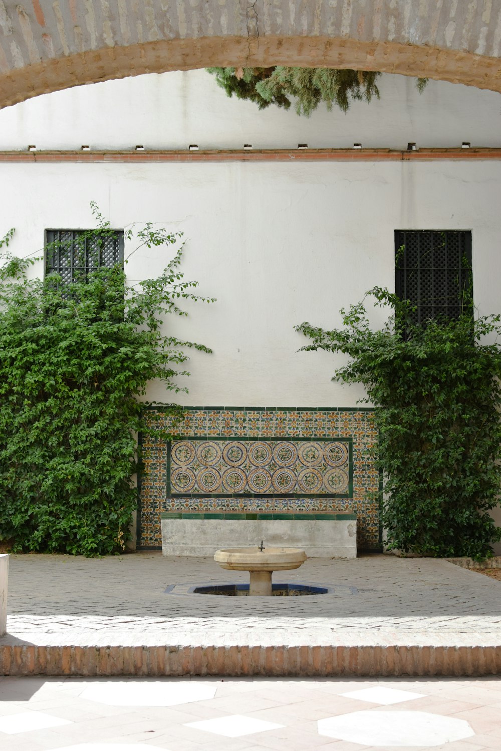 a bench sitting in front of a building