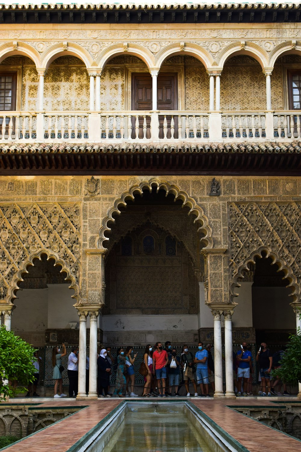 a group of people standing in front of a building