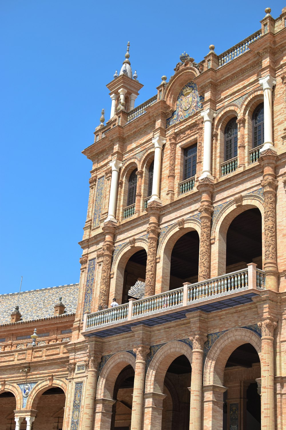 a large building with a clock on the top of it