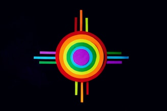 a multicolored circle on a black background