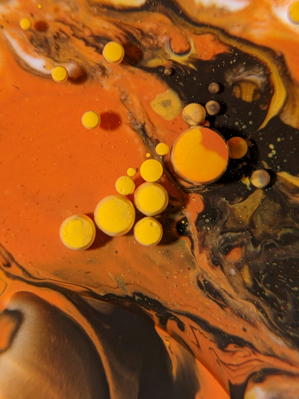 a mixture of yellow and brown liquid in a bowl