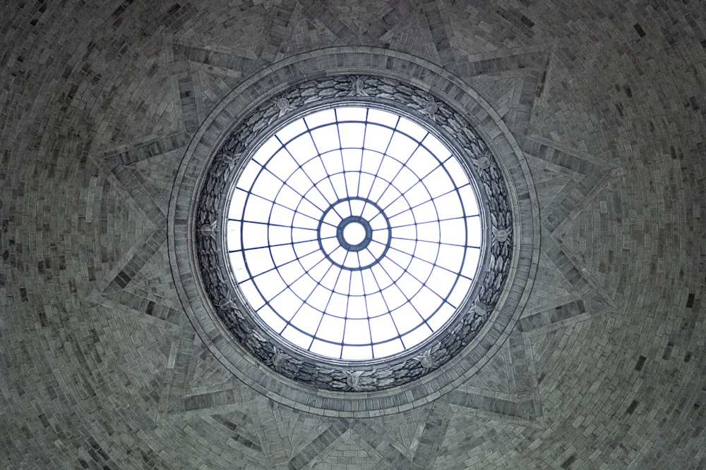 a circular window in the ceiling of a building
