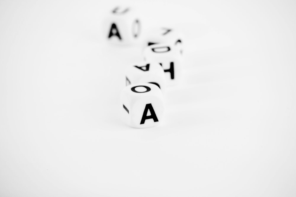 a group of dices that are sitting on a table