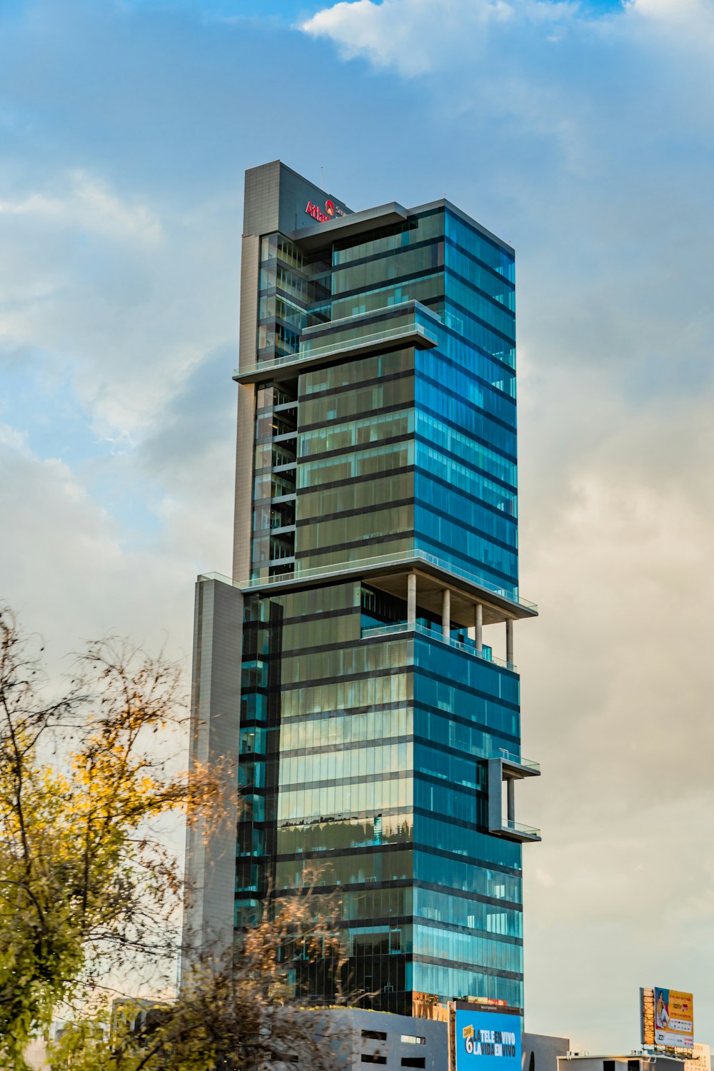 a very tall building with a sky background