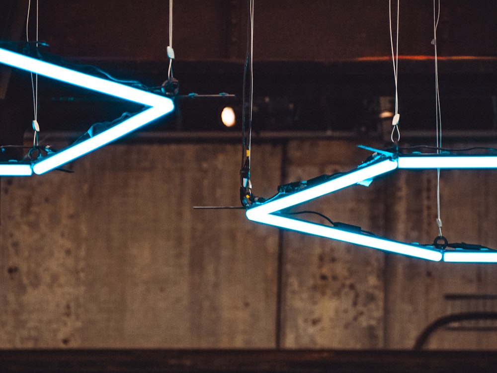 a group of lights hanging from a ceiling