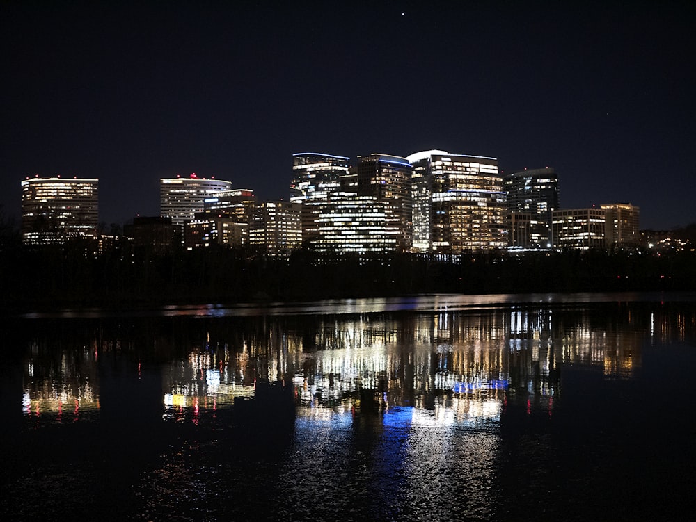 a view of a city at night from across the water