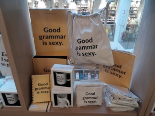 A humorous depiction of a social interaction in a store, with speech bubbles showing playful grammar mistakes.