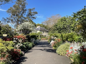 A welcoming rental home exterior with a beautiful garden.