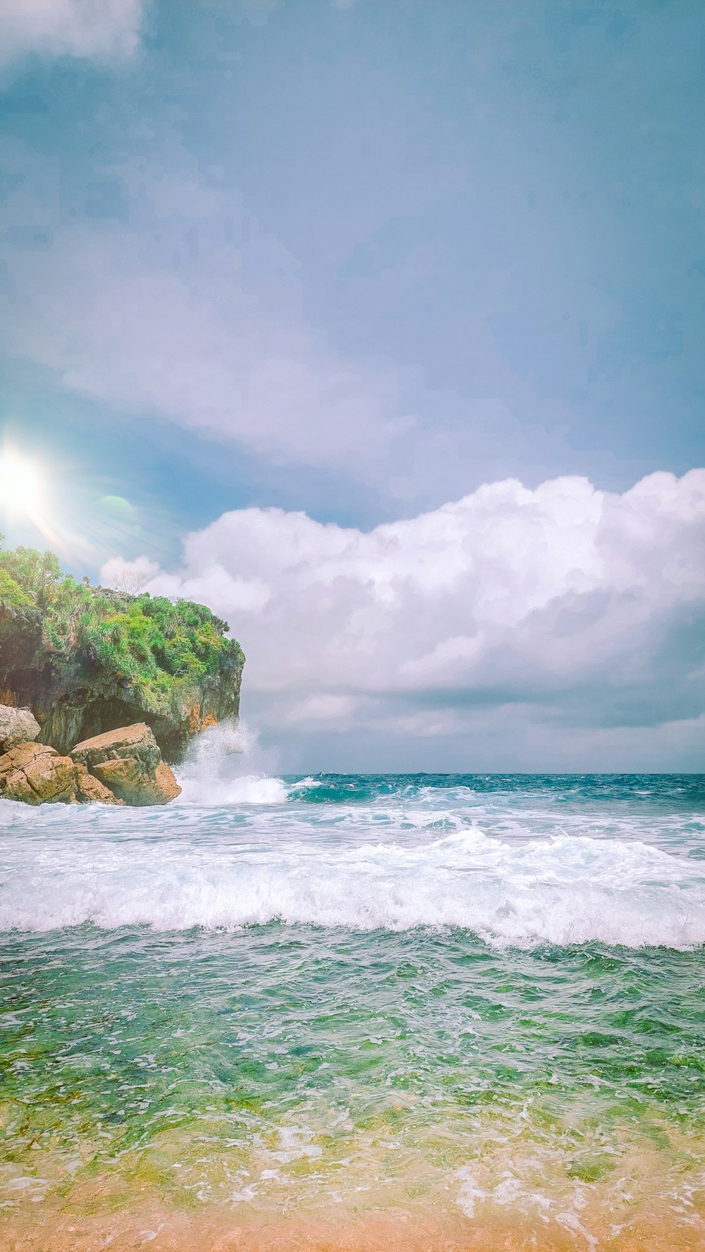 a view of the ocean from the shore