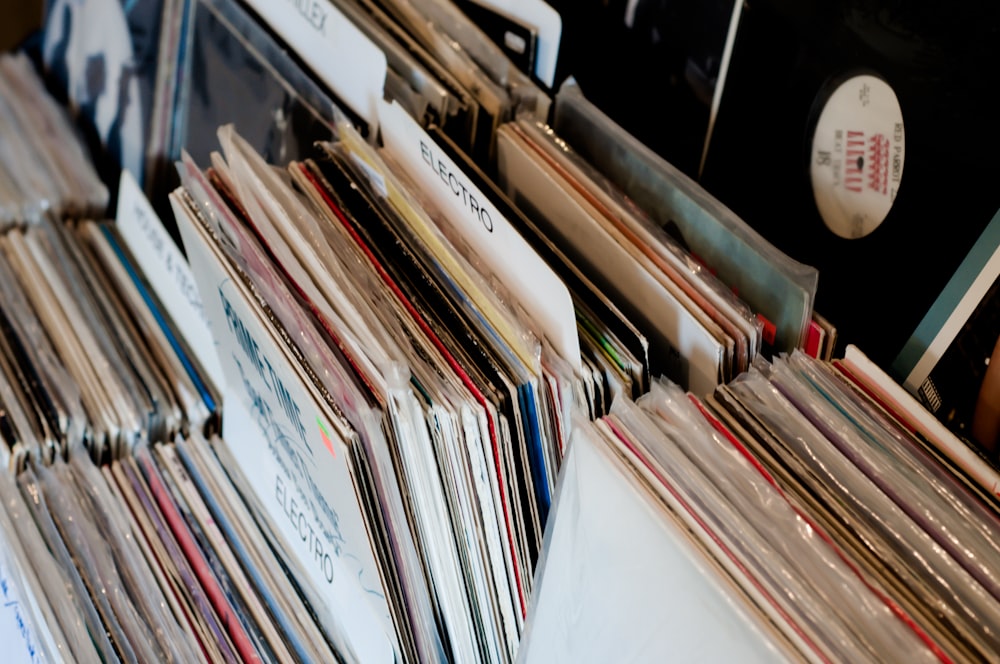 a bunch of records are stacked on top of each other