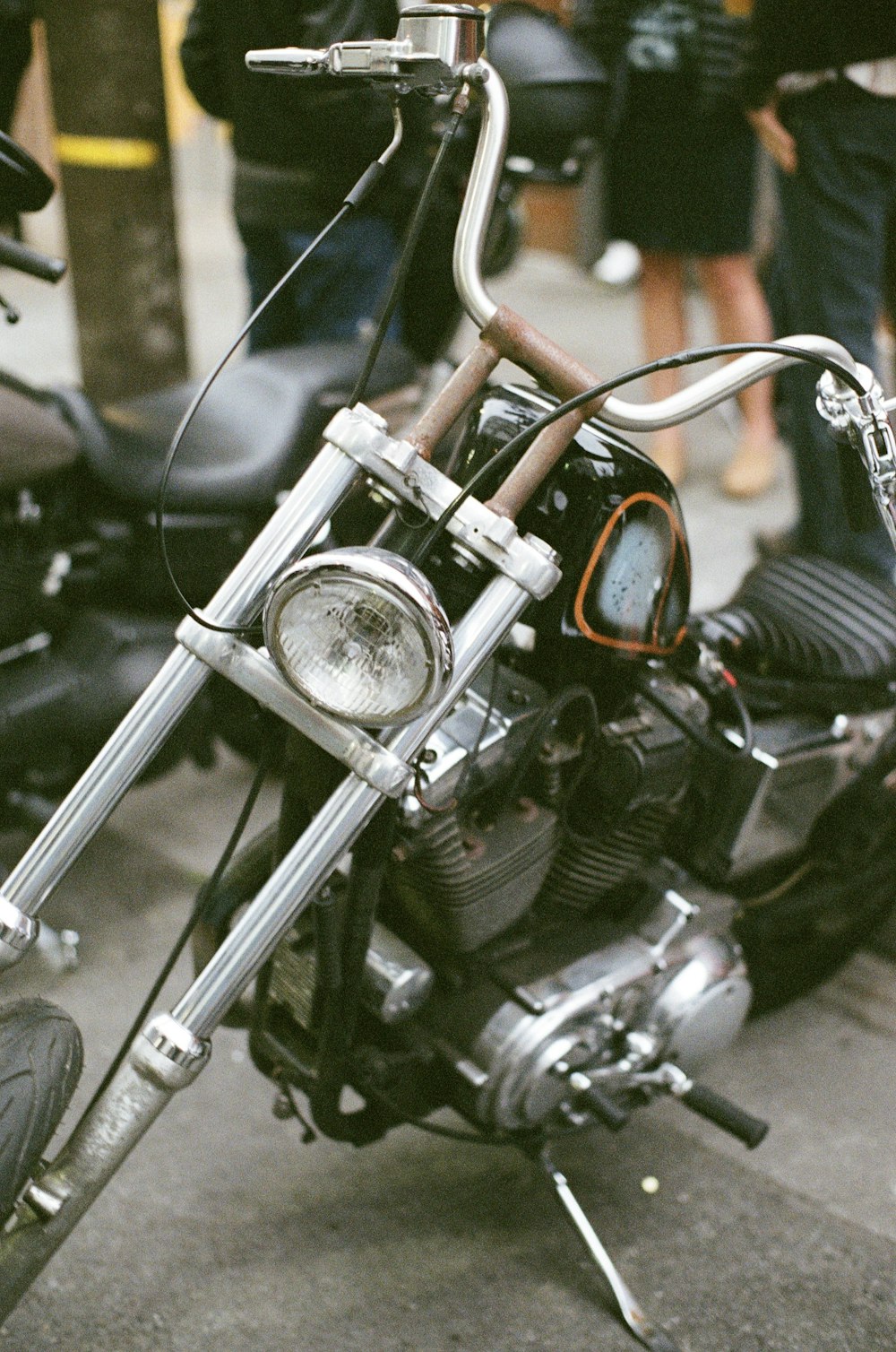 a close up of a motorcycle parked on a street