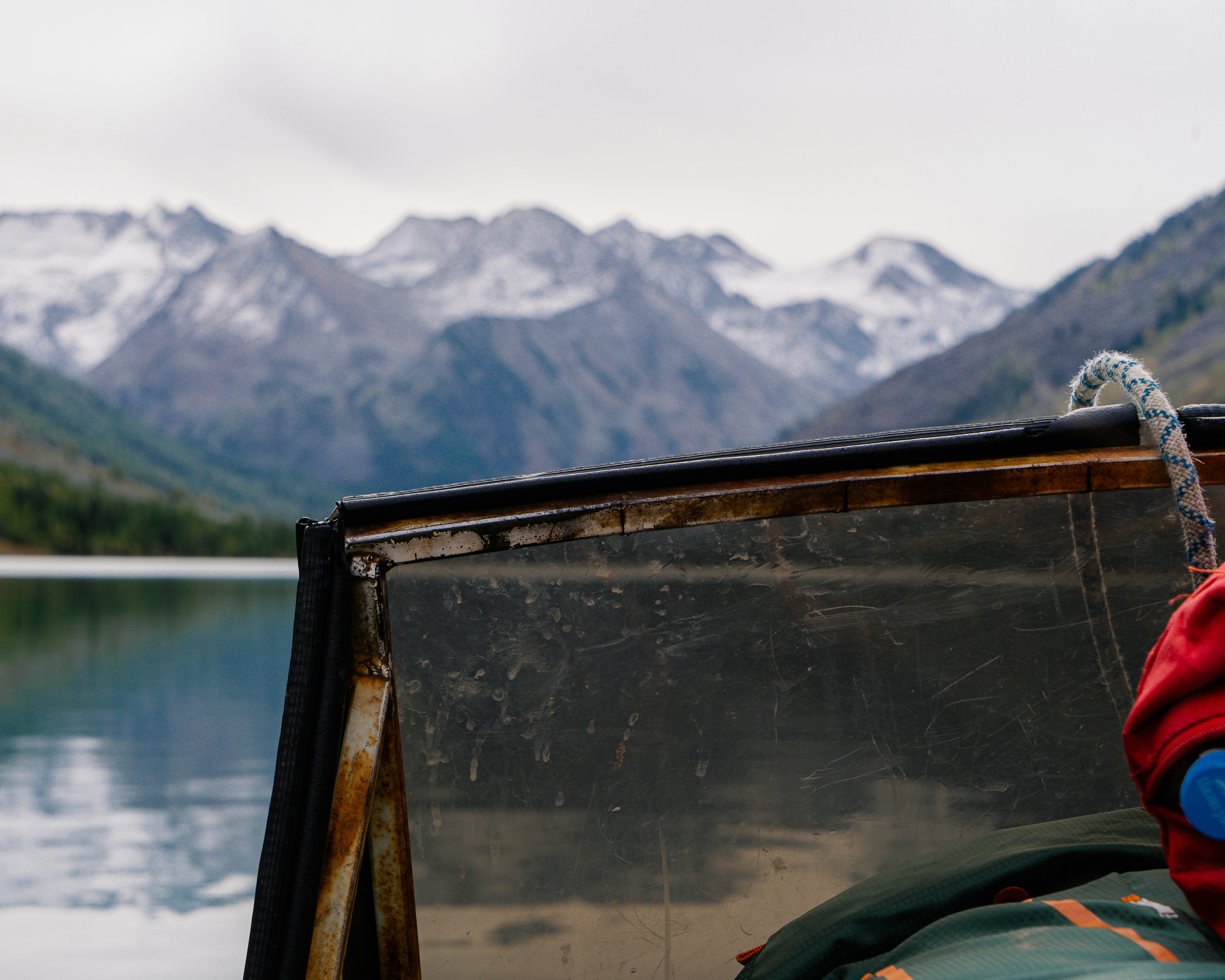 a view of a body of water with mountains in the background
