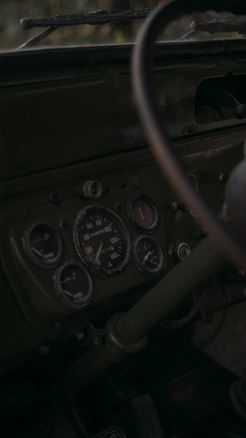 the dashboard of an old military vehicle