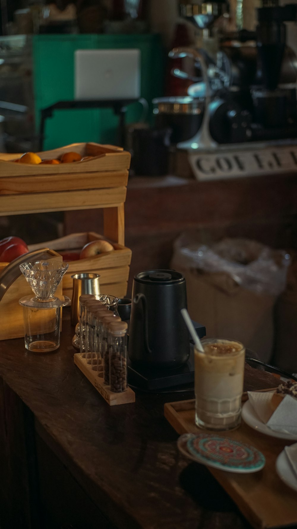a wooden table topped with lots of food and drinks