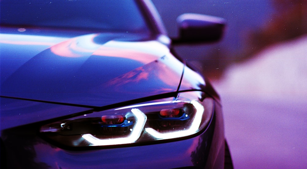 a close up of the headlights of a car